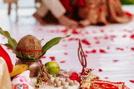 Coconut and mango leaves set on a decorated kalash