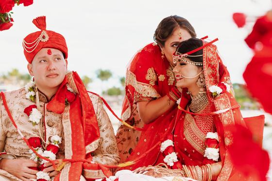 Couple embracing as petals fall