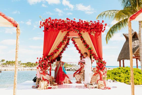 The mandap seen down the aisle with the sea beyond