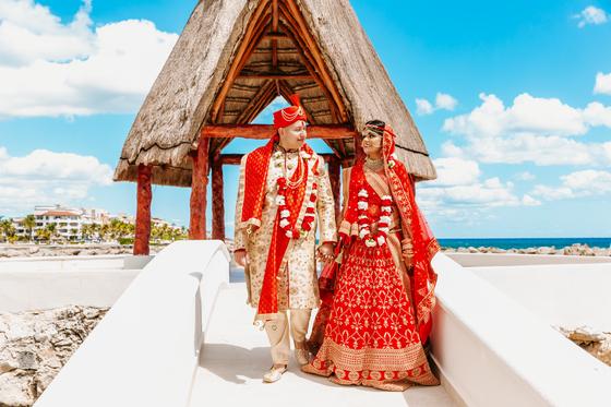 Couple on the white bridge above the water