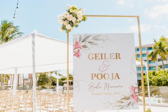 Welcome sign for the Catholic ceremony beside the aisle