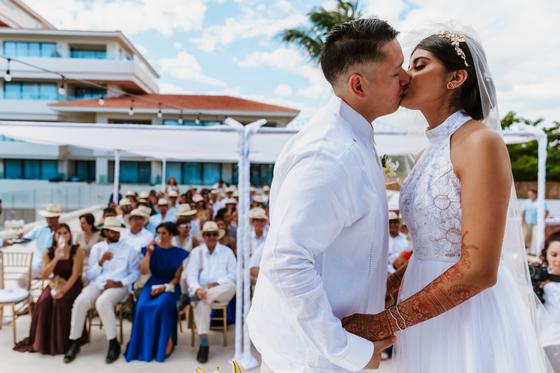The kiss, guests seated behind