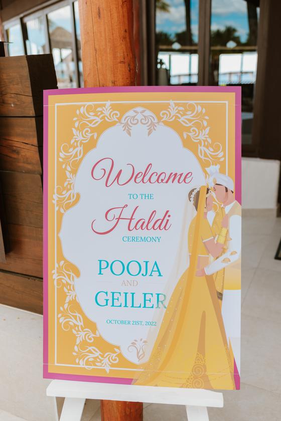 Hand-lettered welcome sign for the haldi ceremony