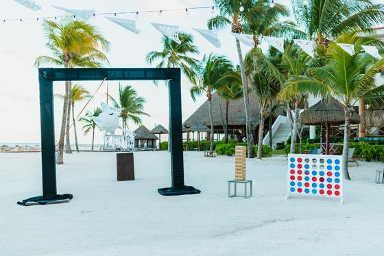 Lawn games set up on the sand beside the reception