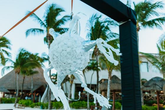 Hanging florals above the reception tables