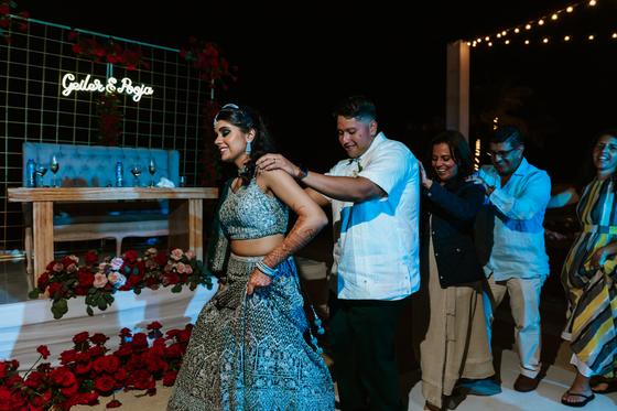 Couple dancing together at the reception