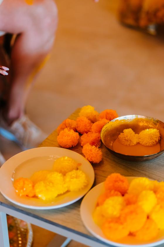 Close detail of marigold heads and turmeric