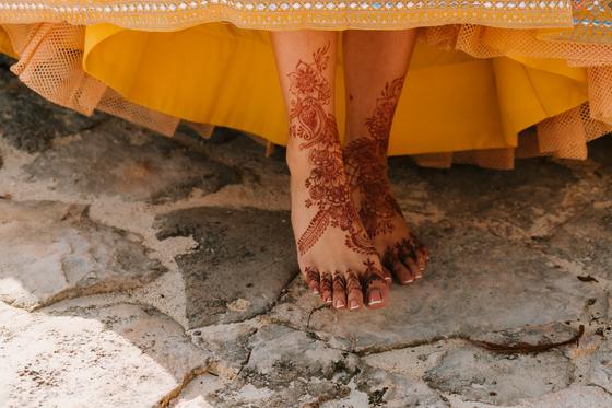 Mehndi worked across the top of the foot