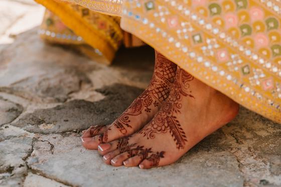 Close detail of mehndi on the bride's feet