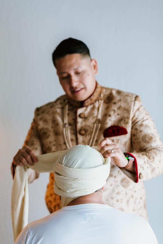 The groom's safa being tied before the baraat