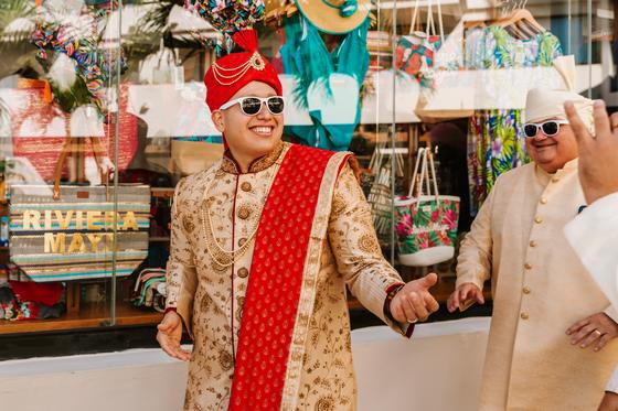 Groom dancing at the head of his baraat