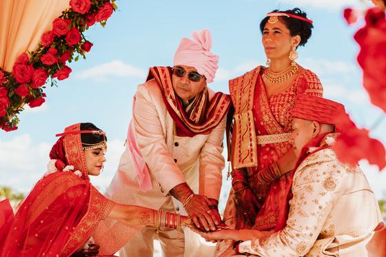 Couple seated at the mandap during the rites