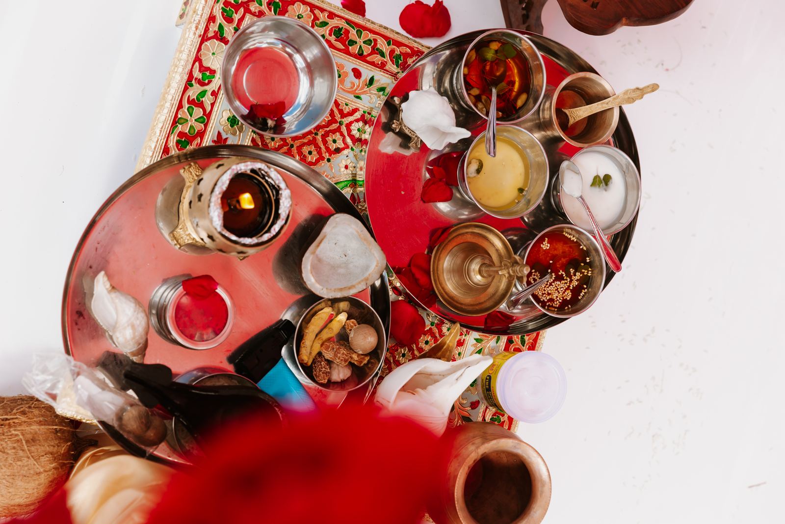 Puja thali of brass vessels and offerings