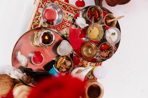Puja thali of brass vessels and offerings